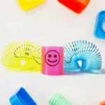 Multicolor Magic Smiley Spring, Spring Toys, Slinky spring toy(12 Pcs Set) - Image 4