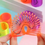 Multicolor Magic Smiley Spring, Spring Toys, Slinky spring toy(12 Pcs Set) - Image 3